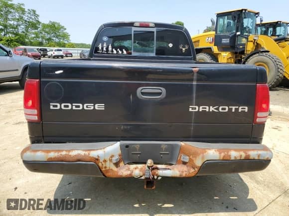 2003 Dodge Dakota Sport with VIN 1D7HL38X13S339796, listed as a Copart auction lot 59045075 with 198,091 mi miles and Salvage title. Bid and sale history available at DreamBid. Image 6.