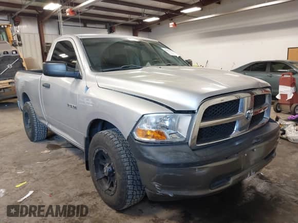 2010 Dodge 1500 ST with VIN 3D7JB1EK8AG170124, listed as a IAAI auction lot 41571732 with 116,987 mi miles and . Bid and sale history available at DreamBid. Image 1.