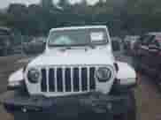 2022 Jeep Wrangler Unlimited Sahara Altitude with VIN 1C4HJXEG9NW232468, listed as a IAAI auction lot 42667697 with 40,881 mi miles and . Bid and sale history available at DreamBid. Image 13.