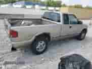 2000 Chevrolet S-10 LS z VIN 1GCDT19W0YK211706, wystawiony jako Copart lot #69227405 z przebiegiem 156 404 mil mil oraz Szkoda całkowita • Salvage title. Historia ofert i sprzedaży dostępna na DreamBid. Obrazek 3.