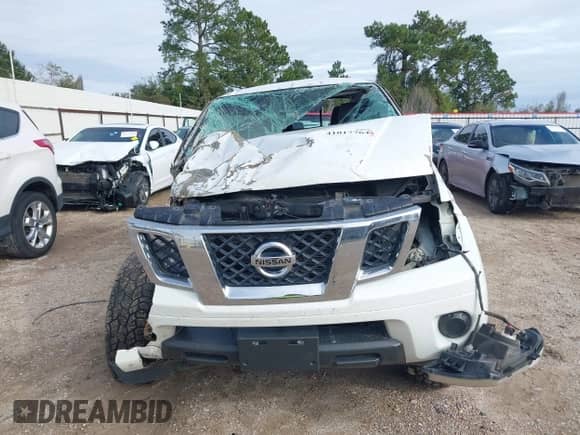 2017 Nissan Frontier SV with VIN 1N6DD0EV2HN765247, listed as a IAAI auction lot 41017764 with 141,942 mi miles and . Bid and sale history available at DreamBid. Image 13.