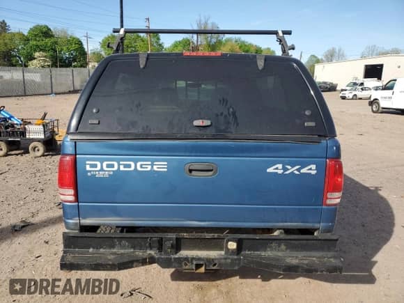 2002 Dodge Dakota Sport с VIN 1B7GG32N52S661020, выставлен на аукционе Copart как лот 54403215 с пробегом 133 284 миль миль и Списание • Salvage title. История ставок и продаж доступна на DreamBid. Изображение 6.