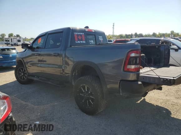 2020 Ram 1500 Rebel z VIN 1C6SRFLT0LN233317, wystawiony jako Copart lot #70363135 z przebiegiem 124 850 mil mil oraz Szkoda całkowita • Salvage title. Historia ofert i sprzedaży dostępna na DreamBid. Obrazek 2.