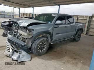 2019 Toyota Tacoma SR with VIN 3TMCZ5ANXKM271710, listed as a Copart auction lot 80954785 with 113,567 mi miles and Salvage title. Bid and sale history available at DreamBid. Image 1.