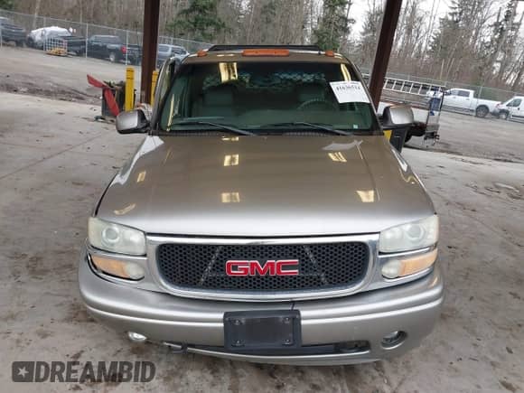 2002 GMC Sierra 1500 Denali z VIN 2GTFK69U421321155, wystawiony jako IAAI lot #41636514 z przebiegiem 171 955 mil mil oraz . Historia ofert i sprzedaży dostępna na DreamBid. Obrazek 12.
