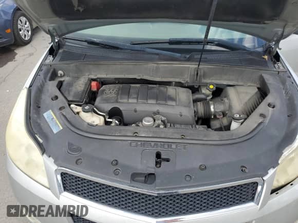 2009 Chevrolet Traverse LS z VIN 1GNEV13D89S175312, wystawiony jako Copart lot #63101105 z przebiegiem 208 709 mil mil oraz Szkoda całkowita • Salvage title. Historia ofert i sprzedaży dostępna na DreamBid. Obrazek 12.