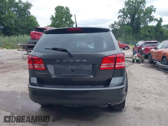 2014 Dodge Journey American Value with VIN 3C4PDCAB3ET285663, listed as a IAAI auction lot 42894235 with 117,285 mi miles and . Bid and sale history available at DreamBid. Image 16.