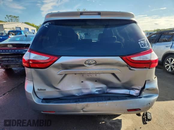 2015 Toyota Sienna LE with VIN 5TDKK3DC8FS638172, listed as a Copart auction lot 83946765 with 97,089 mi miles and Salvage title. Bid and sale history available at DreamBid. Image 6.