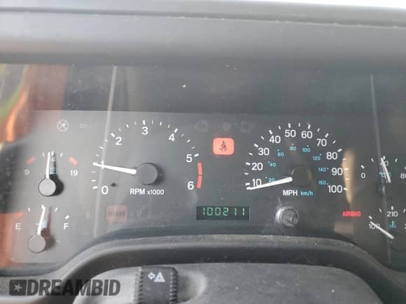 2000 Jeep Wrangler SE with VIN 1J4FA29P4YP775935, listed as a Copart auction lot 80458955 with 100,211 mi miles and Salvage title. Bid and sale history available at DreamBid. Image 9.