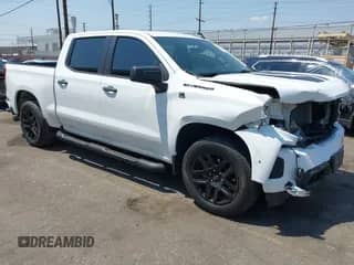 2022 Chevrolet Silverado 1500 Custom z VIN 1GCPWBEKXNZ147044, wystawiony jako IAAI lot #42973391 z przebiegiem 39 400 mil mil oraz . Historia ofert i sprzedaży dostępna na DreamBid. Obrazek 1.