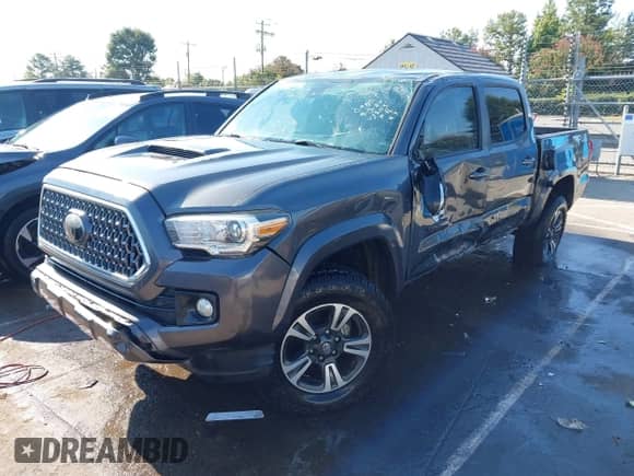 2019 Toyota Tacoma SR5 z VIN 3TMCZ5AN2KM231203, wystawiony jako IAAI lot #43203975 z przebiegiem 61 168 mil mil oraz . Historia ofert i sprzedaży dostępna na DreamBid. Obrazek 2.
