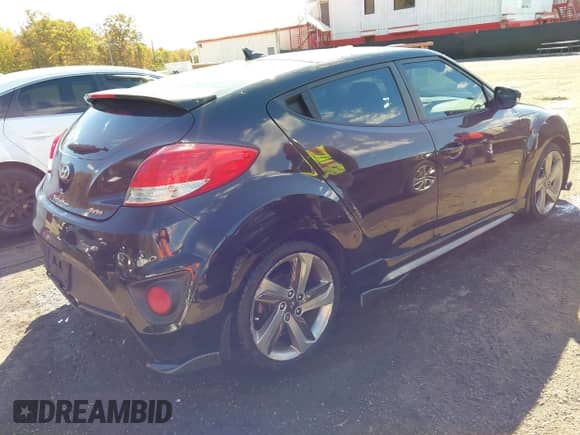 2013 Hyundai Veloster Turbo с VIN KMHTC6AE8DU156928, выставлен на аукционе IAAI как лот 43471857 с пробегом 103 265 миль миль и . История ставок и продаж доступна на DreamBid. Изображение 4.