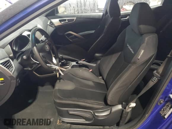 2012 Hyundai Veloster w/Black Int z VIN KMHTC6AD3CU078659, wystawiony jako Copart lot #71902465 z przebiegiem 130 632 mil mil oraz Szkoda całkowita • Salvage title. Historia ofert i sprzedaży dostępna na DreamBid. Obrazek 7.