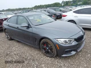 2015 BMW 4 Series 435i xDrive with VIN WBA4B3C51FD670403, listed as a IAAI auction lot 42927811 with Not provided miles and . Bid and sale history available at DreamBid. Image 1.