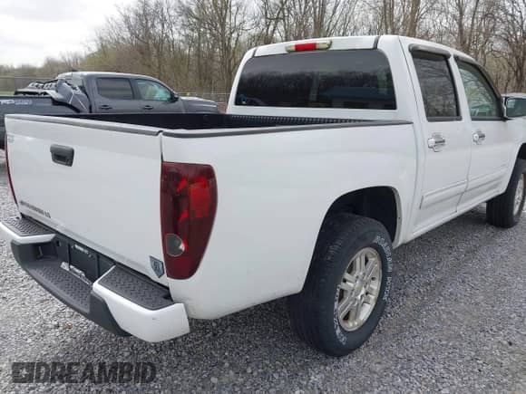 2011 Chevrolet Colorado 1LT z VIN 1GCHTCFE6B8141559, wystawiony jako IAAI lot #41812559 z przebiegiem 147 848 mil mil oraz . Historia ofert i sprzedaży dostępna na DreamBid. Obrazek 6.