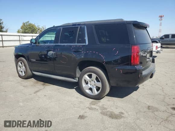 2019 Chevrolet Tahoe LS z VIN 1GNSCAKC6KR230757, wystawiony jako Copart lot #72027705 z przebiegiem 82 004 mil mil oraz Szkoda całkowita • Salvage title. Historia ofert i sprzedaży dostępna na DreamBid. Obrazek 2.