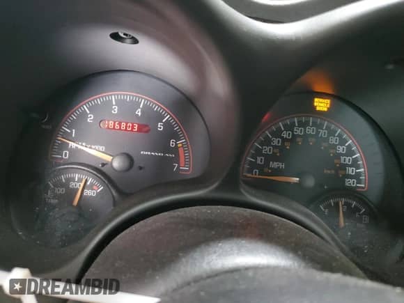 2004 Pontiac Grand Am SE1 with VIN 1G2NF52E84M669999, listed as a Copart auction lot 70597345 with 186,803 mi miles and Salvage title. Bid and sale history available at DreamBid. Image 9.