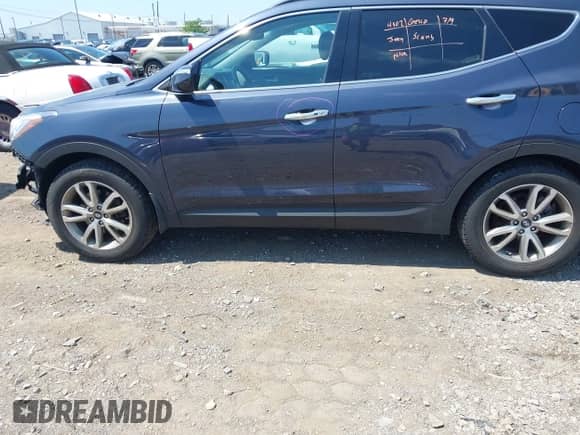 2016 Hyundai Santa Fe with VIN 5XYZUDLA7GG357896, listed as a IAAI auction lot 42808592 with 50,159 mi miles and . Bid and sale history available at DreamBid. Image 14.