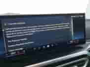 2024 BMW i4 eDrive35 with VIN WBY43AW06RFS58764, listed as a IAAI auction lot 42165759 with 12,007 mi miles and . Bid and sale history available at DreamBid. Image 19.