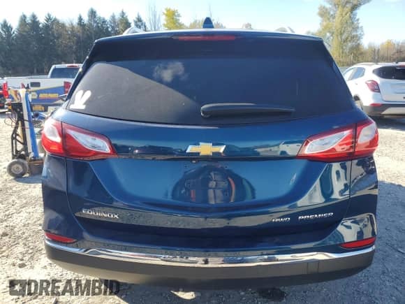 2020 Chevrolet Equinox Premier с VIN 2GNAXXEV0L6121661, выставлен на аукционе Copart как лот 90585015 с пробегом 80 147 миль миль и Списание • Salvage title. История ставок и продаж доступна на DreamBid. Изображение 6.