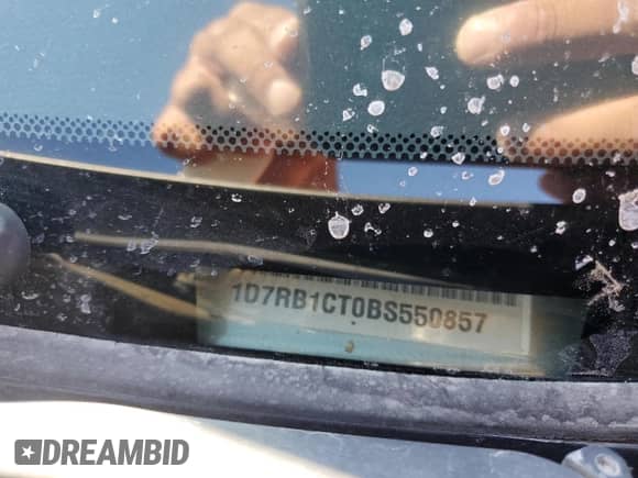 2011 Ram 1500 Sport с VIN 1D7RB1CT0BS550857, выставлен на аукционе Copart как лот 80562105 с пробегом 224 306 миль миль и Списание • Salvage title. История ставок и продаж доступна на DreamBid. Изображение 12.