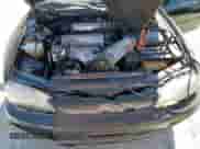 1995 Toyota Camry LE z VIN 4T1SK12E1SU572333, wystawiony jako Copart lot #80828565 z przebiegiem 151 689 mil mil oraz Szkoda całkowita • Salvage title. Historia ofert i sprzedaży dostępna na DreamBid. Obrazek 11.