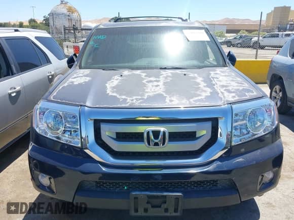 2011 Honda Pilot Touring с VIN 5FNYF3H98BB056455, выставлен на аукционе IAAI как лот 42897379 с пробегом 173 871 миль миль и . История ставок и продаж доступна на DreamBid. Изображение 12.