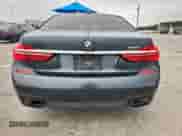 2017 BMW 7 Series 740i с VIN WBA7E2C34HG740975, выставлен на аукционе Copart как лот 71019405 с пробегом 90 805 миль миль и Списание • Salvage title. История ставок и продаж доступна на DreamBid. Изображение 6.