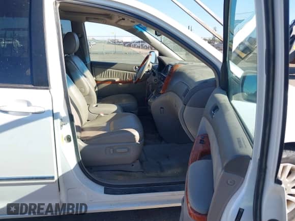 2009 Toyota Sienna XLE with VIN 5TDZK22C59S276897, listed as a IAAI auction lot 43165842 with 214,043 mi miles and . Bid and sale history available at DreamBid. Image 5.