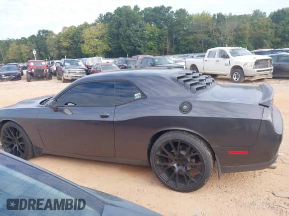 2015 Dodge Challenger SXT z VIN 2C3CDZAG6FH821338, wystawiony jako IAAI lot #43251442 z przebiegiem 160 796 mil mil oraz . Historia ofert i sprzedaży dostępna na DreamBid. Obrazek 14.