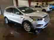 2017 Ford Escape Titanium with VIN 1FMCU9JD1HUA79587, listed as a Copart auction lot 84209285 with 61,058 mi miles and Clean title. Bid and sale history available at DreamBid. Image 4.