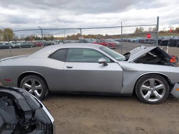 2013 Dodge Challenger SXT с VIN 2C3CDYAG1DH674806, выставлен на аукционе IAAI как лот 43503030 с пробегом 78 811 миль миль и . История ставок и продаж доступна на DreamBid. Изображение 13.