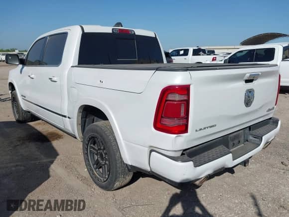 2020 Ram 1500 Limited z VIN 1C6SRFHT8LN190922, wystawiony jako IAAI lot #41961670 z przebiegiem 120 100 mil mil oraz . Historia ofert i sprzedaży dostępna na DreamBid. Obrazek 3.