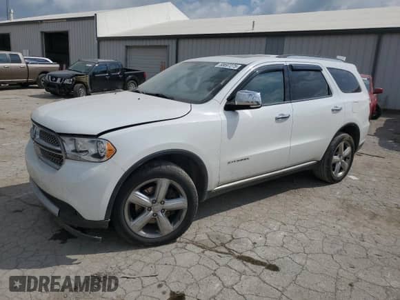 2013 Dodge Durango Citadel with VIN 1C4SDJET0DC603976, listed as a Copart auction lot 58697275 with 135,489 mi miles and Salvage title. Bid and sale history available at DreamBid. Image 1.