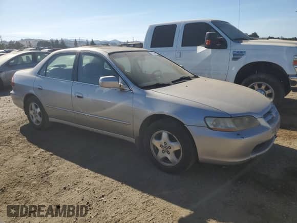 1999 Honda Accord EX with VIN 1HGCG1654XA010134, listed as a Copart auction lot 67599455 with 263,752 mi miles and Salvage title. Bid and sale history available at DreamBid. Image 4.