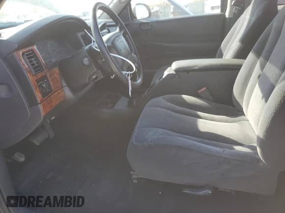 2003 Dodge Dakota с VIN 1D7HG12XX3S110986, выставлен на аукционе Copart как лот 77675734 с пробегом 108 529 миль миль и Списание • Salvage title. История ставок и продаж доступна на DreamBid. Изображение 7.