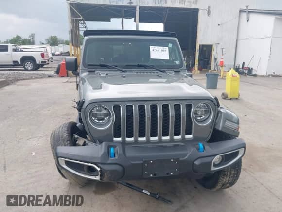 2022 Jeep Wrangler Unlimited Sahara with VIN 1C4JJXP64NW232223, listed as a IAAI auction lot 42641049 with 32,903 mi miles and . Bid and sale history available at DreamBid. Image 6.