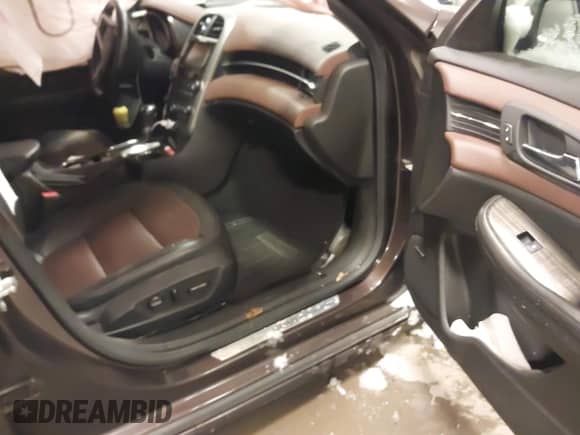 2015 Chevrolet Malibu LTZ with VIN 1G11F5SL0FF203329, listed as a IAAI auction lot 41310725 with 81,968 mi miles and . Bid and sale history available at DreamBid. Image 5.