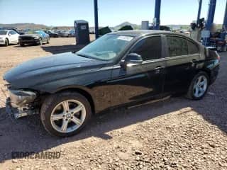 2015 BMW 3 Series 328i xDrive with VIN WBA3B3G54FNT18254, listed as a Copart auction lot 82123945 with 158,832 mi miles and Salvage title. Bid and sale history available at DreamBid. Image 1.