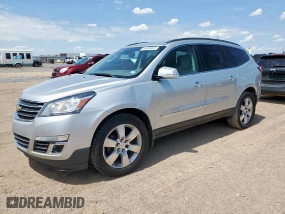 2015 Chevrolet Traverse LTZ с VIN 1GNKVJKD0FJ328089, выставлен на аукционе Copart как лот 69699025 с пробегом 165 233 миль миль и Списание • Salvage title. История ставок и продаж доступна на DreamBid. Изображение 1.