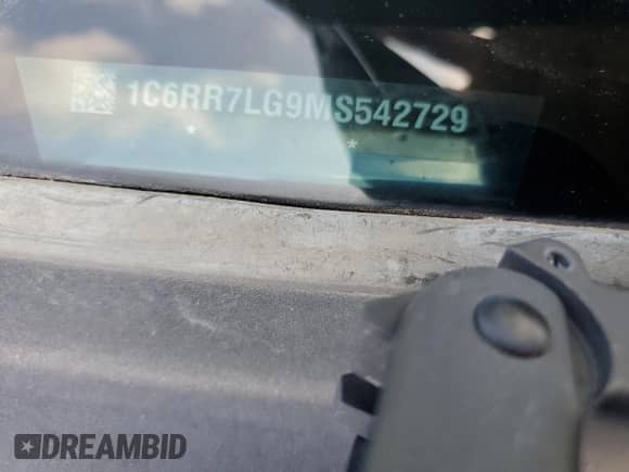 2021 Ram 1500 SLT z VIN 1C6RR7LG9MS542729, wystawiony jako Copart lot #65718185 z przebiegiem 79 442 mil mil oraz Szkoda całkowita • Salvage title. Historia ofert i sprzedaży dostępna na DreamBid. Obrazek 13.