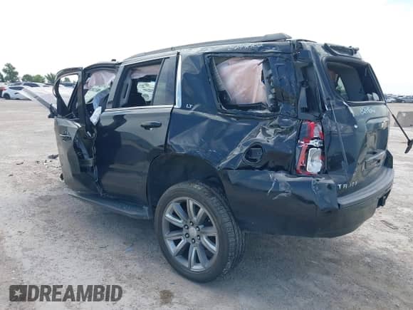 2019 Chevrolet Tahoe LT with VIN 1GNSCBKC1KR115800, listed as a IAAI auction lot 42884267 with Not provided miles and . Bid and sale history available at DreamBid. Image 3.