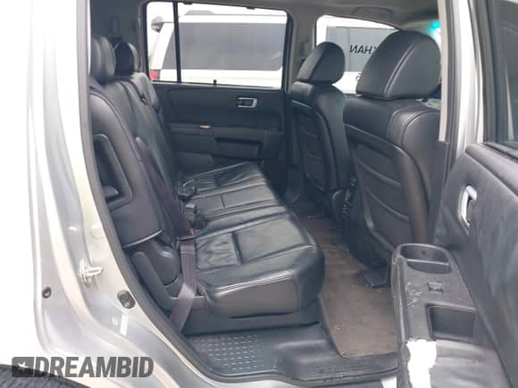 2010 Honda Pilot Touring with VIN 5FNYF3H94AB022723, listed as a IAAI auction lot 42378211 with 326,338 mi miles and . Bid and sale history available at DreamBid. Image 8.