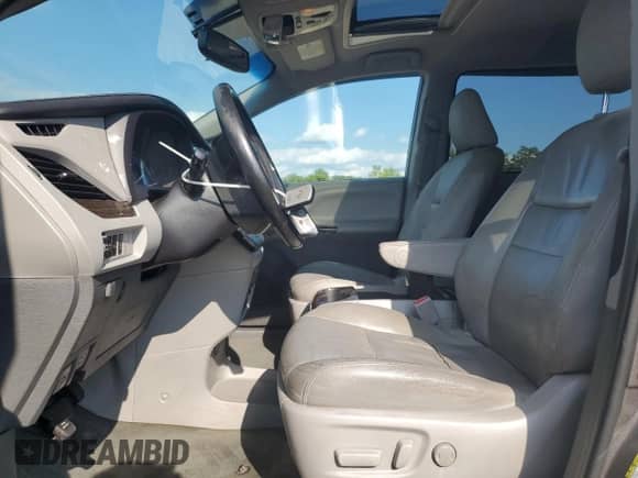 2016 Toyota Sienna XLE with VIN 5TDYK3DC3GS696878, listed as a Copart auction lot 69670585 with 148,930 mi miles and Salvage title. Bid and sale history available at DreamBid. Image 7.