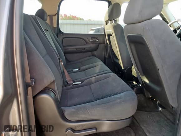 2007 Chevrolet Suburban LT с VIN 1GNFC16017J406329, выставлен на аукционе Copart как лот 81088985 с пробегом Не указан миль и Списание • Salvage title. История ставок и продаж доступна на DreamBid. Изображение 10.