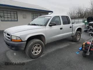 2003 Dodge Dakota Sport with VIN 1D7HG38X43S212335, listed as a Copart auction lot 85670114 with 161,851 mi miles and Salvage title. Bid and sale history available at DreamBid. Image 1.