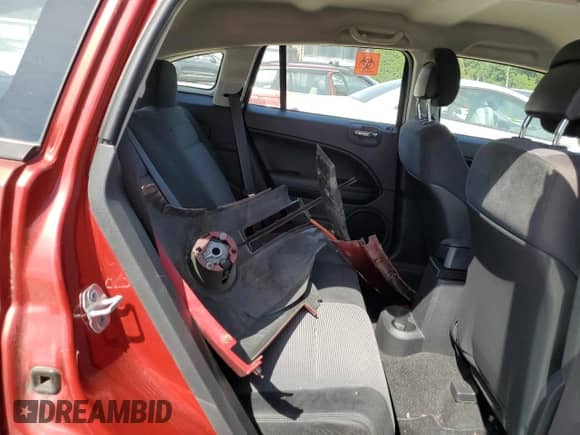 2010 Dodge Caliber Mainstreet с VIN 1B3CB3HA3AD581902, выставлен на аукционе Copart как лот 61320184 с пробегом Не указан миль и Чистый • Clean title. История ставок и продаж доступна на DreamBid. Изображение 10.