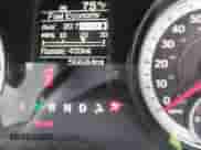 2014 Ram 1500 Express z VIN 3C6JR6ATXEG310186, wystawiony jako IAAI lot #42221601 z przebiegiem 56 684 mil mil oraz . Historia ofert i sprzedaży dostępna na DreamBid. Obrazek 15.