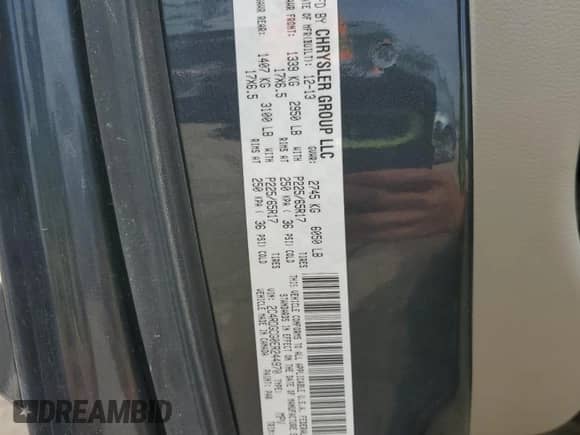 2014 Dodge Grand Caravan SXT 30th Anniversary with VIN 2C4RDGCG0ER244970, listed as a Copart auction lot 84389405 with 139,283 mi miles and Salvage title. Bid and sale history available at DreamBid. Image 13.