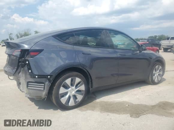 2023 Tesla Model Y with VIN 7SAYGDED6PF960648, listed as a Copart auction lot 67447254 with 18,536 mi miles and Salvage title. Bid and sale history available at DreamBid. Image 3.